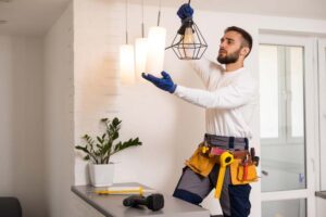 Electrician Changing Lights