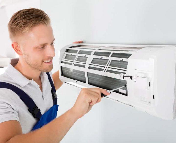 Male Installing Air Conditioner