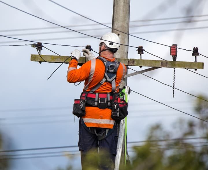 Electrician working on Power Lines